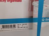 packaging of a box containing a toilet and a sink in a bathroom