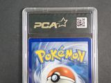 the pokemon game is in a plastic case on a table