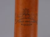 a close up of a baseball bat with a logo on it
