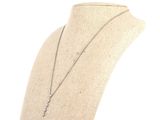 a close up of a mannequin with a necklace on it
