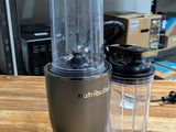 a blender that is sitting on a wooden table