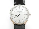 a close up of a wrist watch with roman numerals