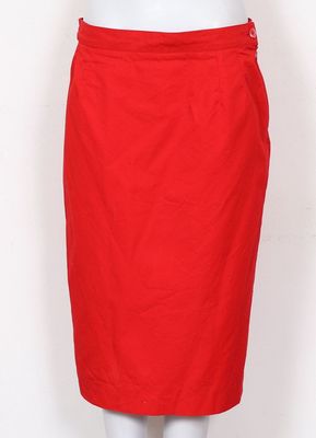 a woman ' s red skirt on a mannequin mannequin mannequin mannequin mannequin mannequin mannequin mannequin