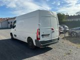 a white van that is parked in a parking lot