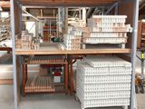 many stacks of boxes on a shelf in a warehouse