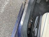 a close up of the inside of a car with the door open