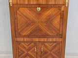 an antique chest of drawers in the style of louis ii