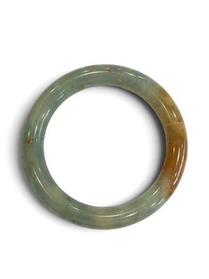 an image of a green jade bracelet on a white surface