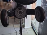 an image of a hair dryer on a stand in a room