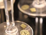 several empty wine glasses sitting on top of a black table
