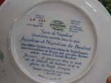 someone is holding a plate with a poem written on it