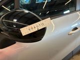 a sticker on the side mirror of a car that says vaaulo