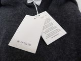a tag attached to a sweater that says be entitled