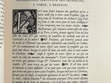 an open book with a picture of a bird on it