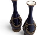 two vases that are sitting next to each other