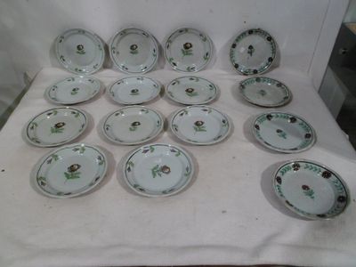 a lot of plates that are sitting on a table