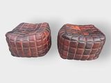 pair of leather stools in the style of a basket