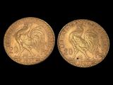 two gold coins, one of which is a rooster and the other of which is a bird
