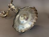 a silver object that is sitting on a table