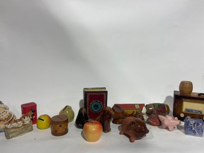 a lot of toys that are sitting on a white surface