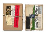 an image of a small book with a piece of paper on top of it