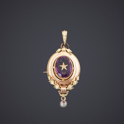un pendentif en or et en améthyste orné d'une étoile