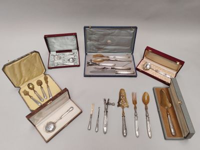 many different types of silverware in a case