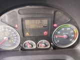a close up of a car dashboard with various gauges
