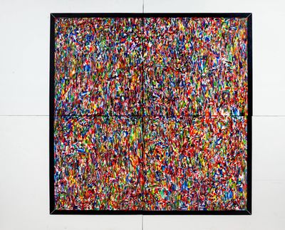 a picture of a colorful painting hanging on the wall