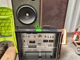two speakers that are stacked on top of each other
