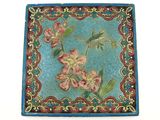 plateau décoratif bleu et rouge orné de fleurs et de libellules
