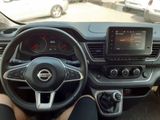 the interior of a car with a steering wheel and dashboard controls