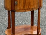 a wooden table with a marble top on it