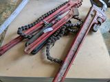 several wrenches are sitting on top of a box on a table