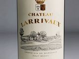 a bottle of wine that is sitting on a table