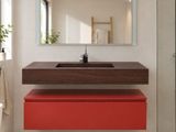 a bathroom with a sink, mirror, and toilet in it