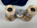 a pair of binoculars that are sitting on a table