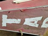 a box that has a sign on it on a table