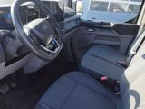 the interior of a car with a steering wheel and a dashboard
