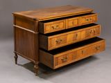 an image of a wooden dresser with three drawers