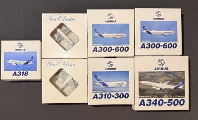 quatre boîtes représentant les avions de ligne d'Air France A380-300 et A340-300