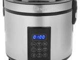 a close up of a slow cooker on a white background