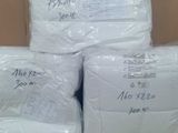 several boxes of toilet paper are stacked on top of each other