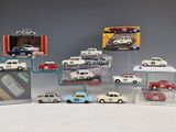 a lot of toy cars that are in a display case