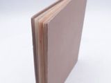 an image of a close up of a book on a white surface