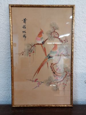 a picture of a picture of a bird on a branch