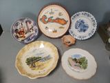 a lot of plates that are sitting on a table