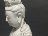 chinese white porcelain figure of a woman with a crown on her head