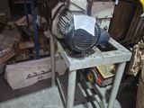 a machine that is sitting on a table in a garage