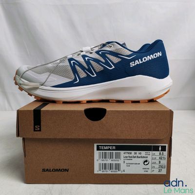 a close up of a pair of shoes on top of a box